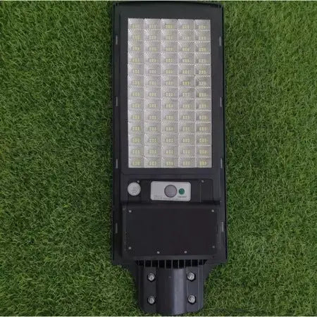 Lampa Stradala cu Incarcare Solara, IP65, 390 Led 500W, Material ABS, 3 Moduri de iluminare, 225 X 600 mm, Senzor de Lumina si Senzor de Miscare, Telecomanda, Brat de Sustinere din Otel 50 cm Lungime Inclus Cosul magic